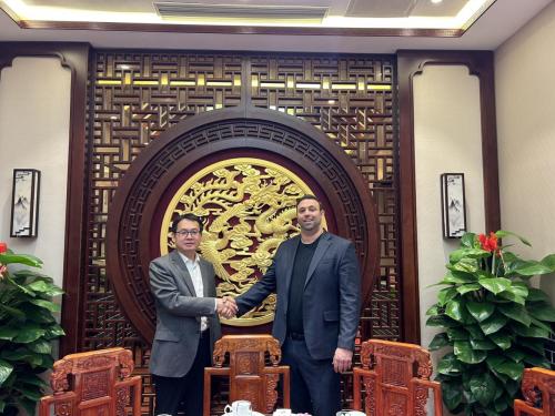 Jack Perry, the Chairman of the 48 Group Club, meet with Mr Hong Junjie, the President of Shandong University of Finance and Economics.